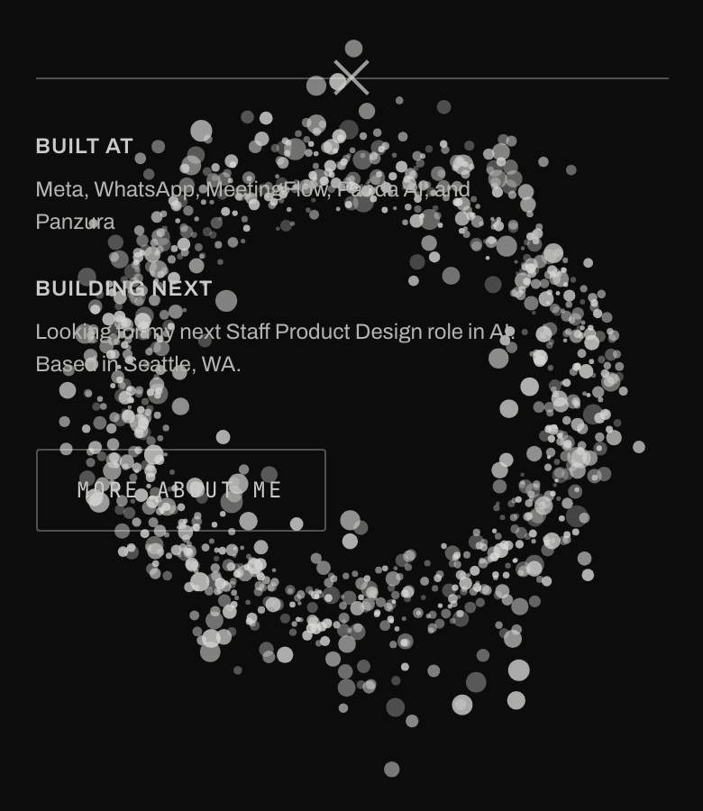 A phone screenshot where the particle ring is drawn over the Built at and Building next text and the More about me button.